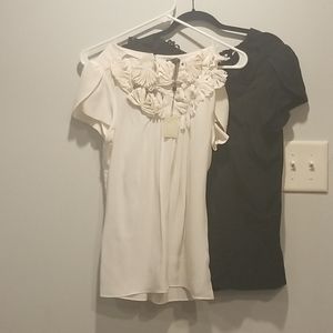 Two one black one white shirt